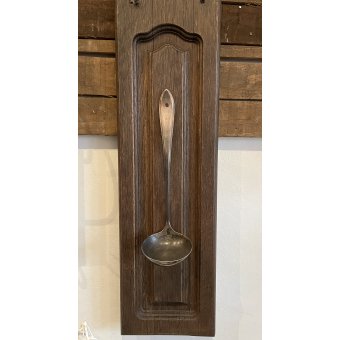 Paneel met oude soeplepel