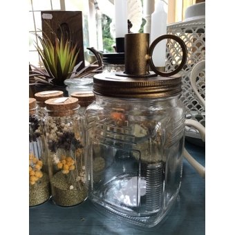 Glazen pot met kaarsenhouder