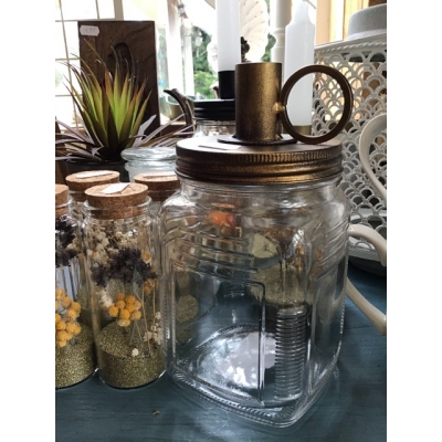 Glazen pot met kaarsenhouder